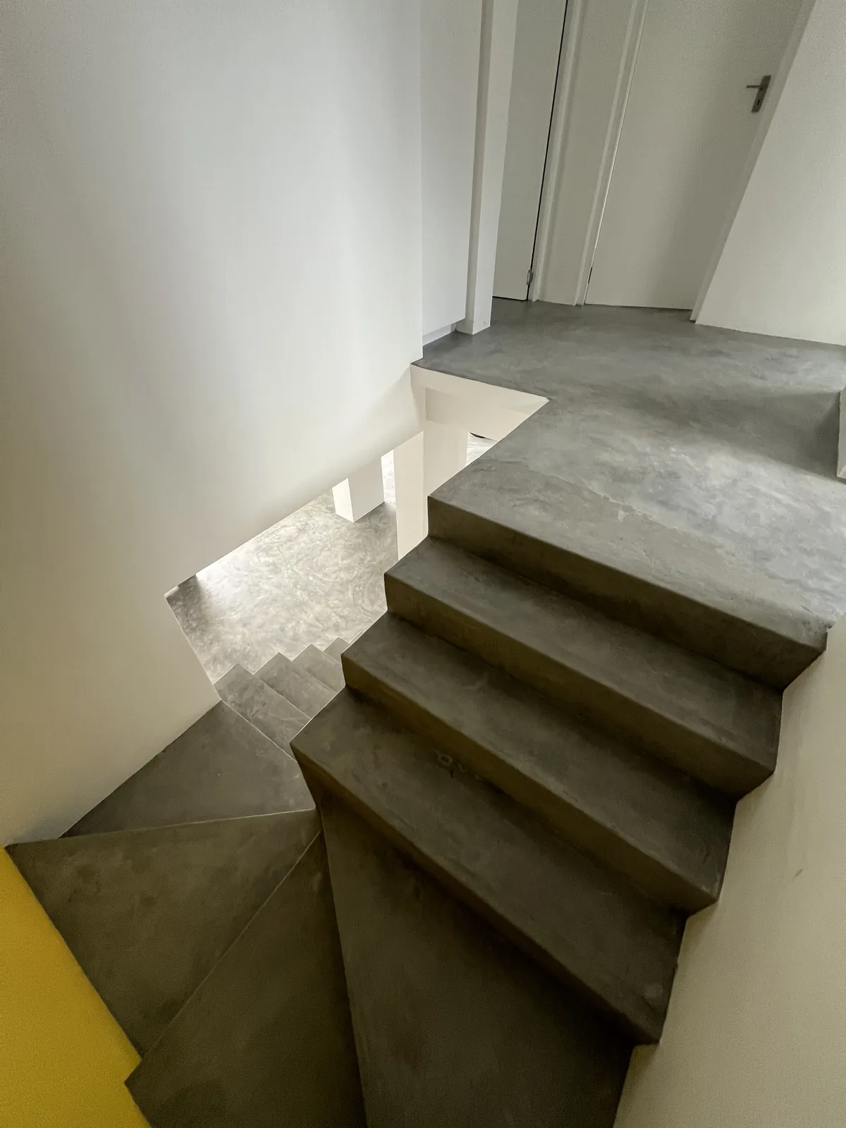 Microcement stairs and upstairs landing