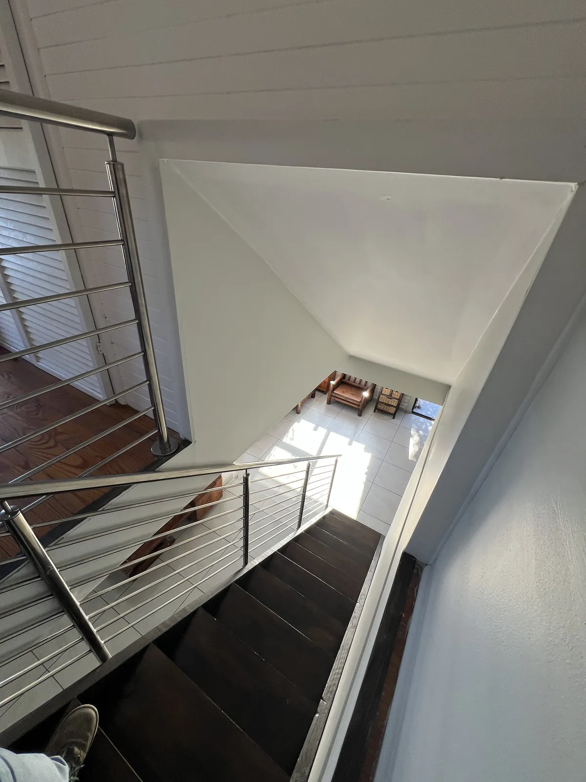 The wider stairwell and balustrade from the top