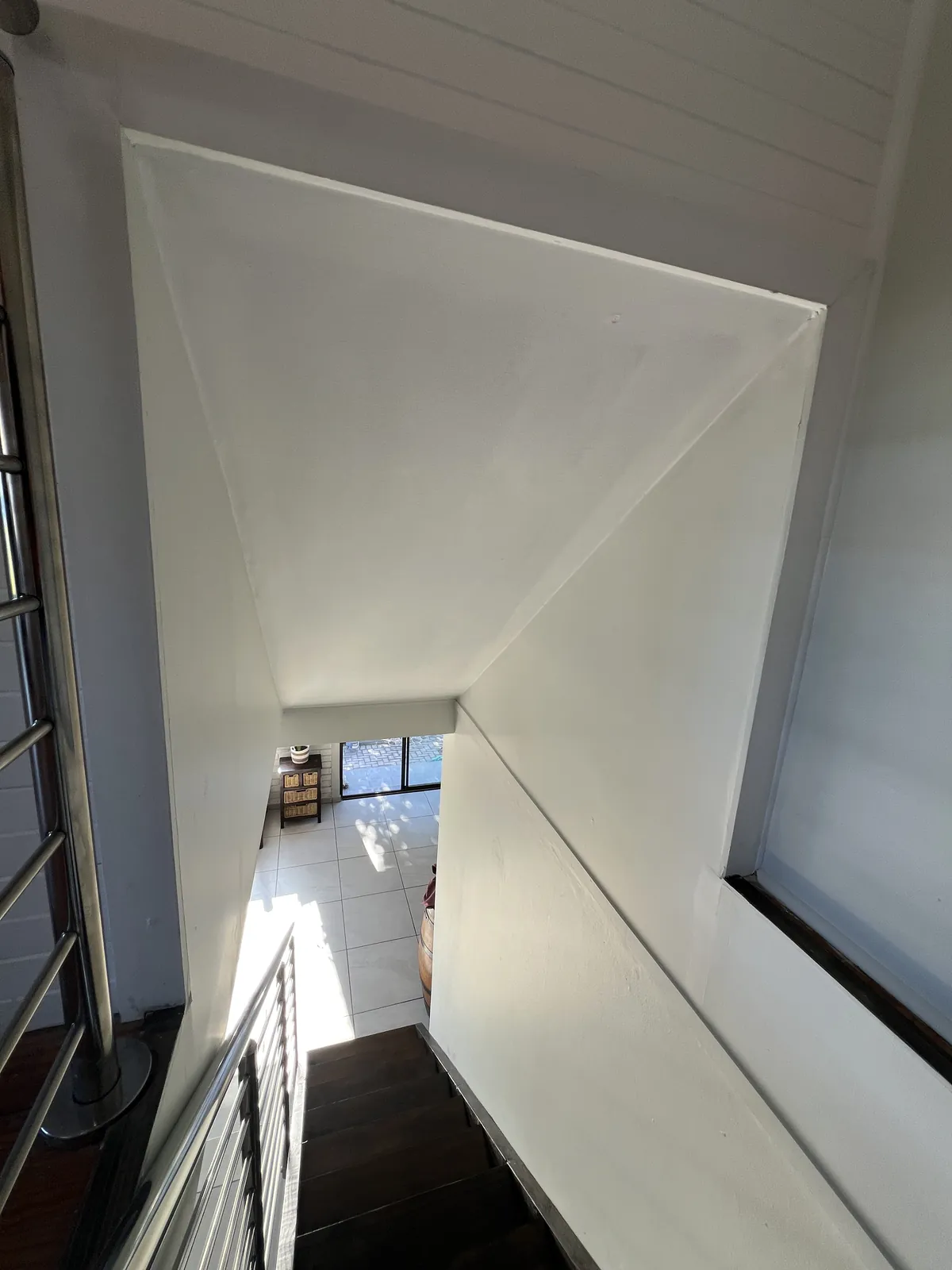 New stairwell opening, finished and painted