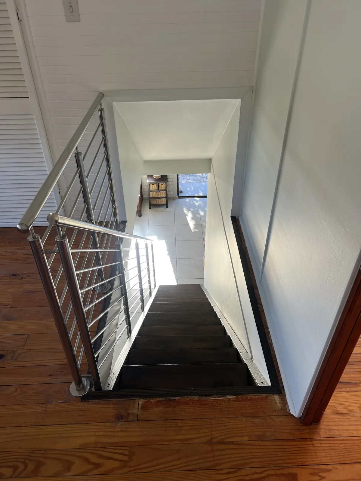 Looking down the new staircase from the first floor