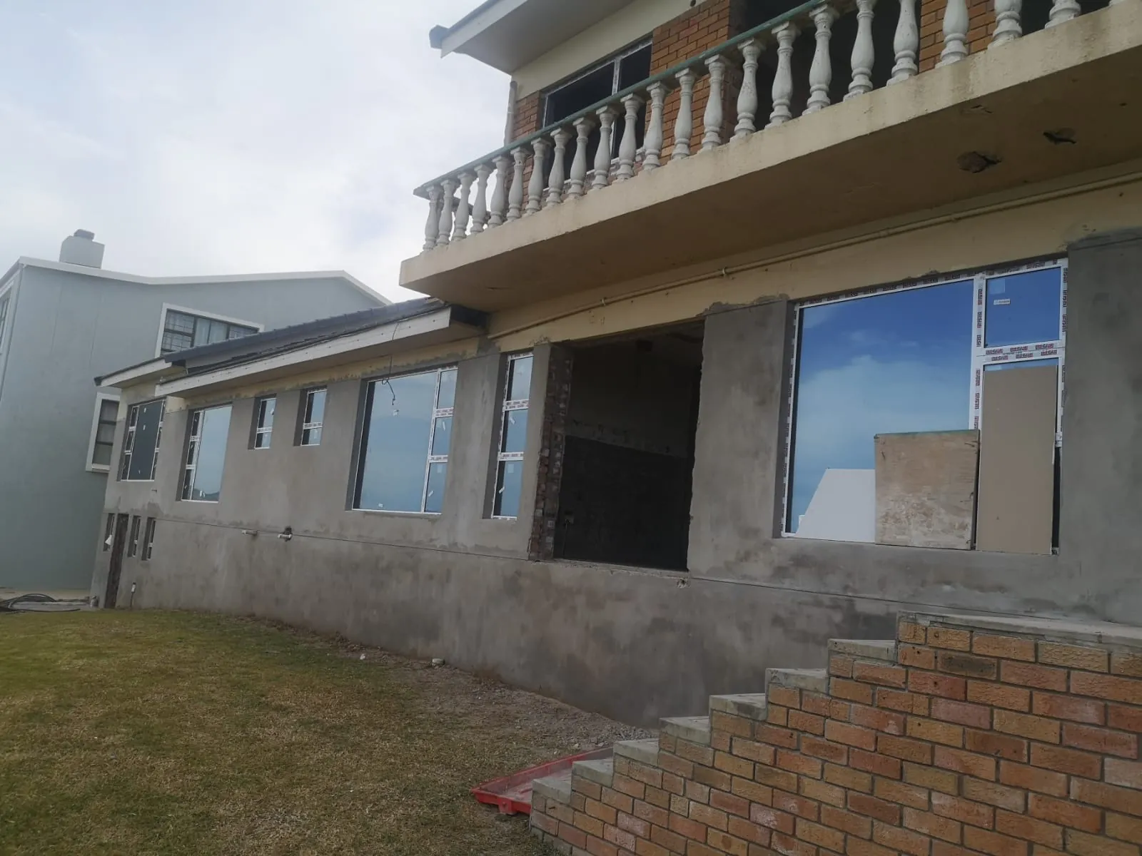 New windows in and the back of the house plastered