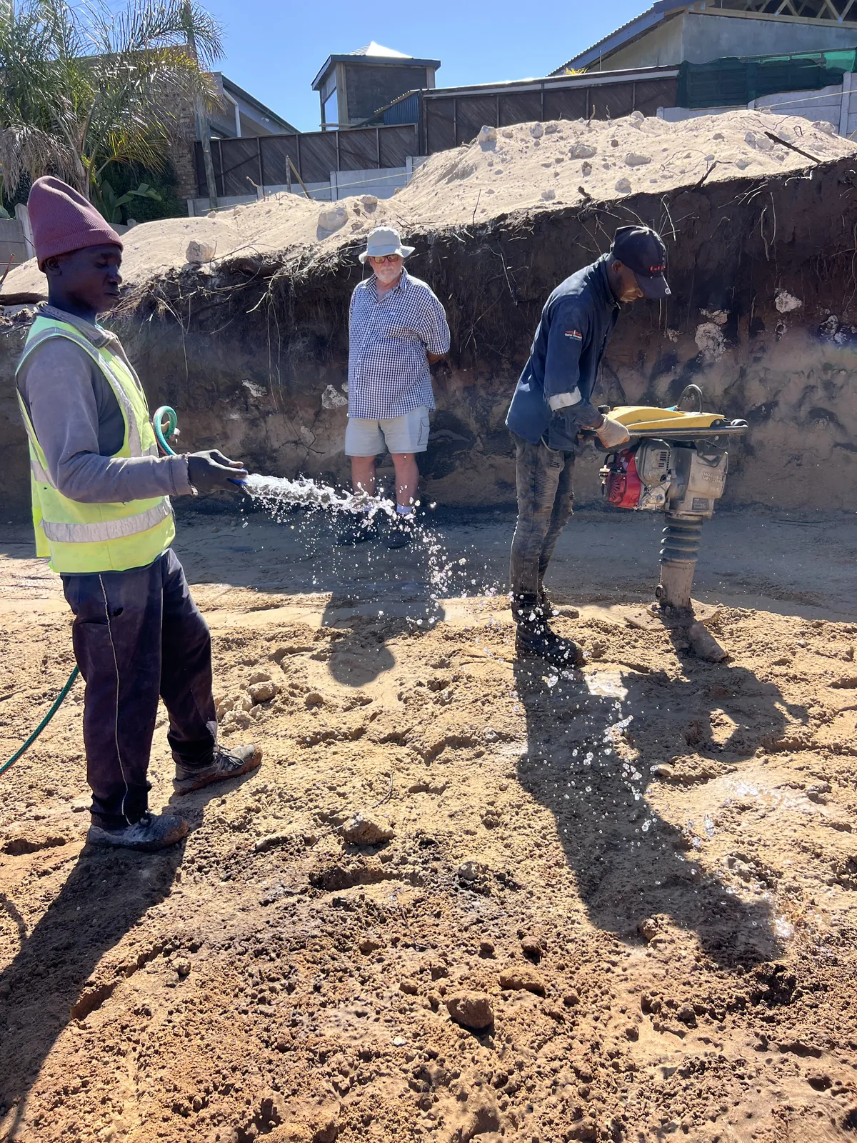 Jacques checking compaction on the excavated platform
