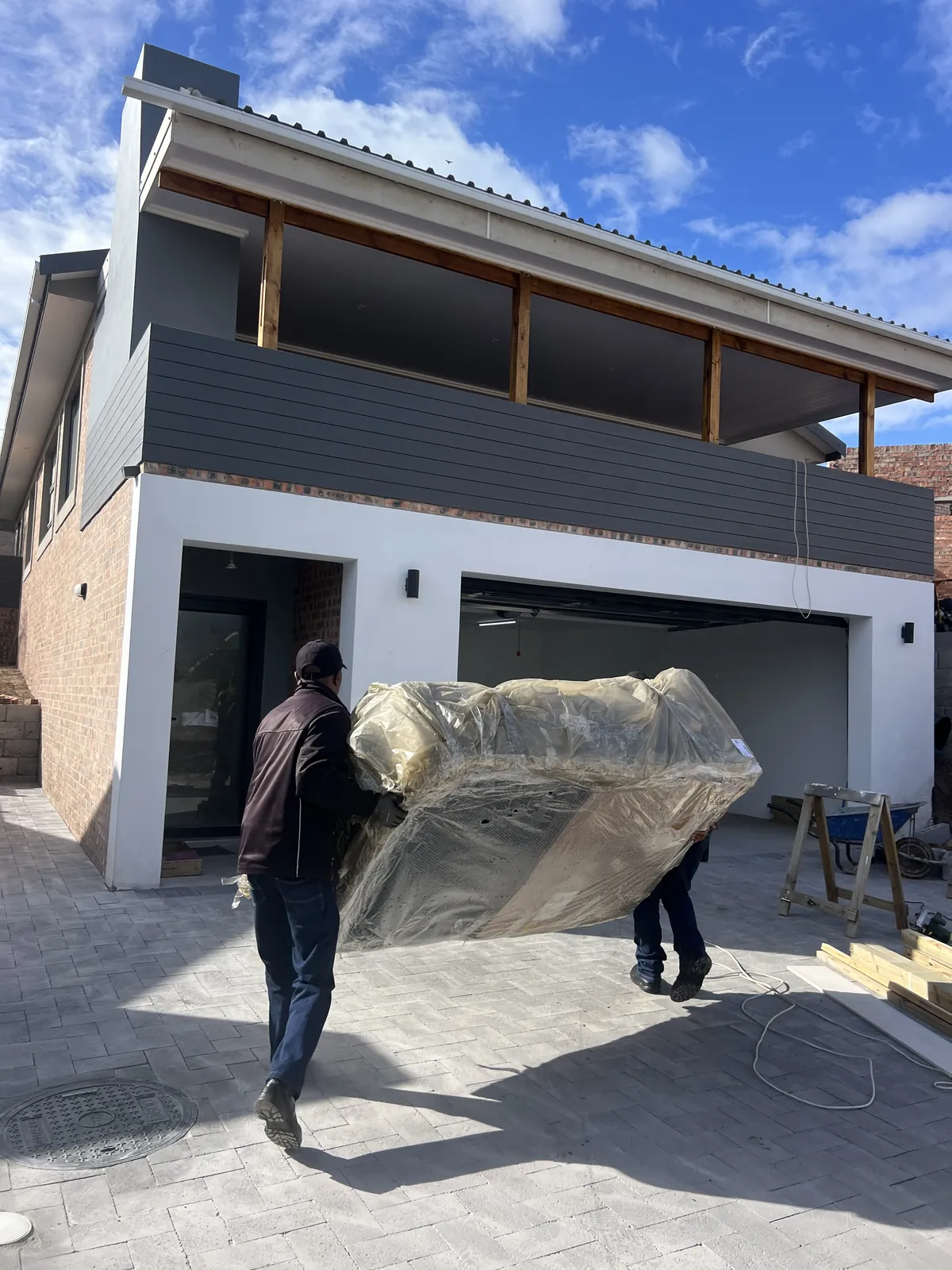 Paving down and final deliveries arriving before handover