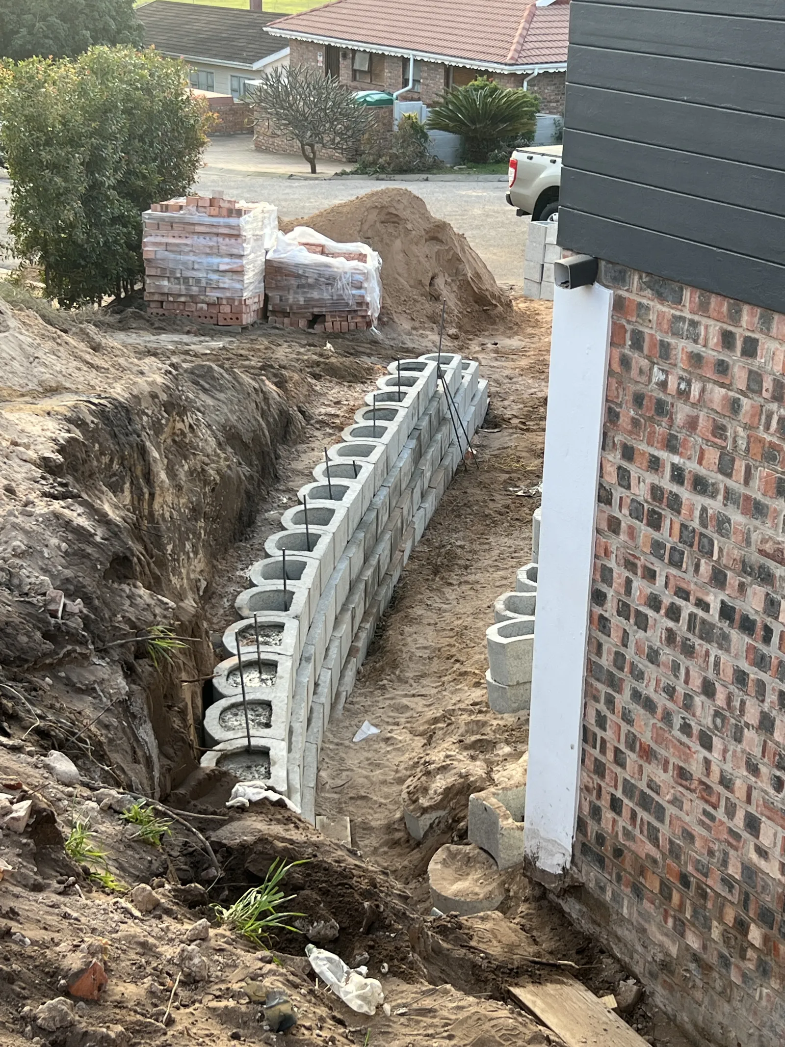 Building a block retaining wall along the side boundary