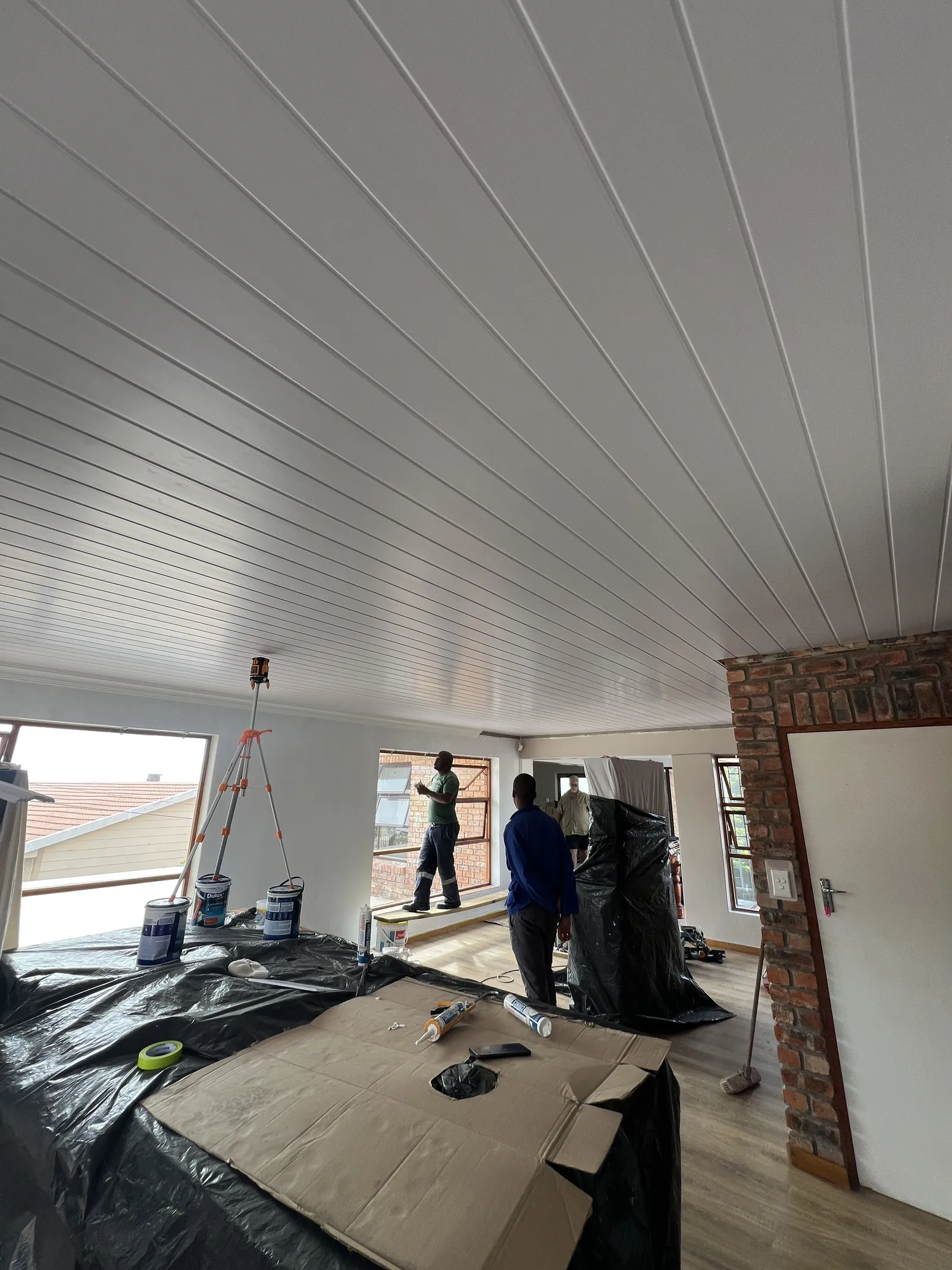 New PVC ceiling fitted across the living area, with the room covered and protected