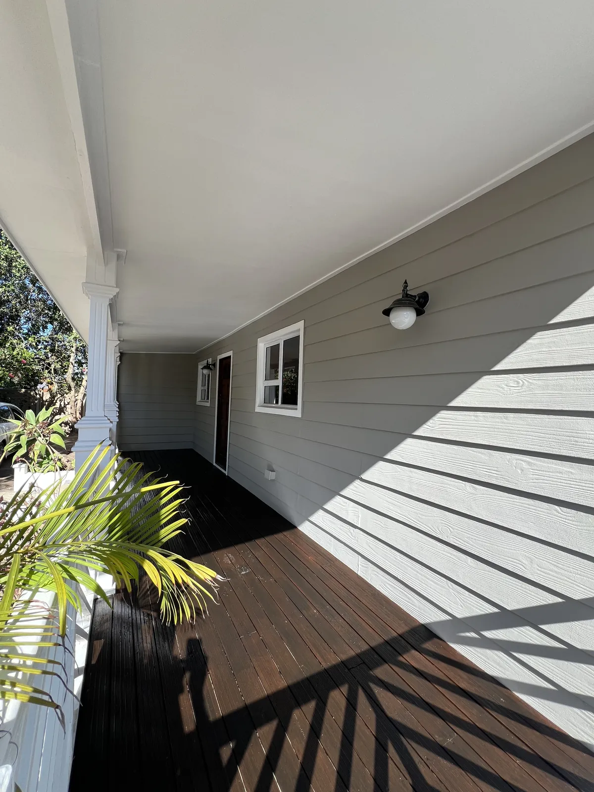 Covered veranda with freshly painted walls and ceiling