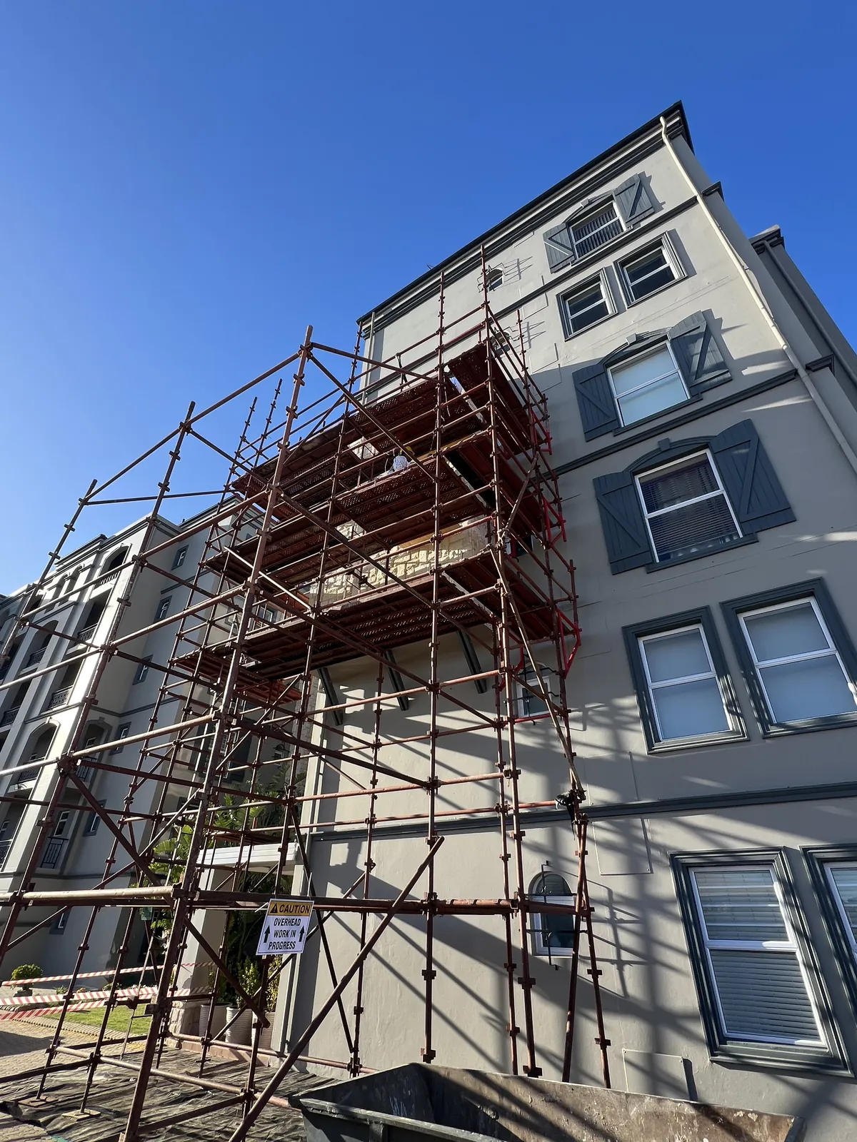 Scaffolding up and the area below barricaded